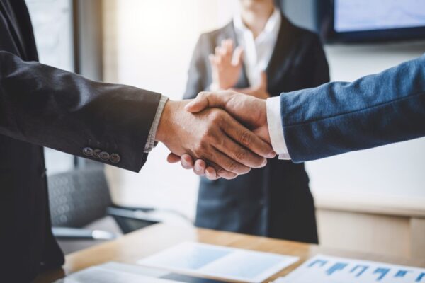 Handshake after meeting discussion trading business